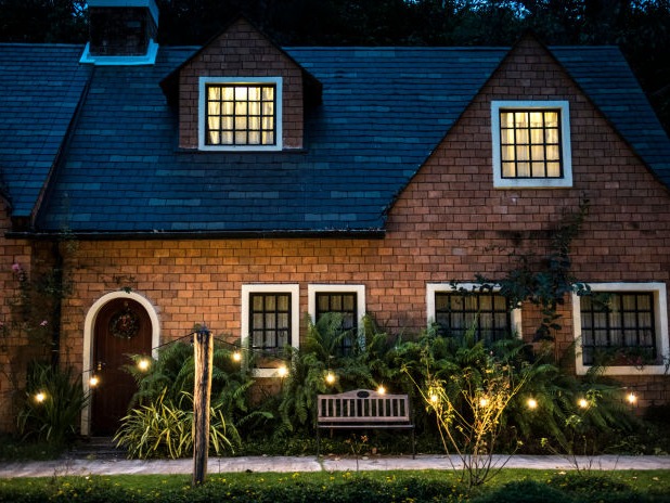 beautiful-red-brick-house-with-decorative-lights-696x464